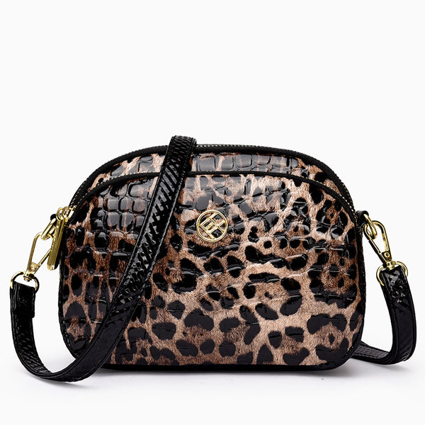 Cartera amimal print redonda