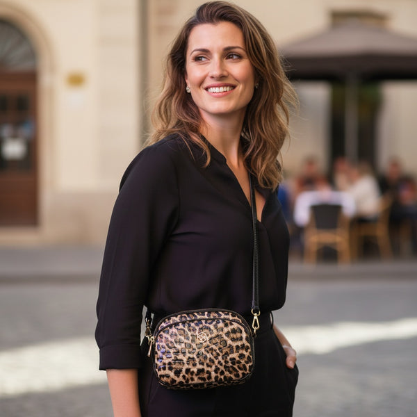 Cartera amimal print redonda